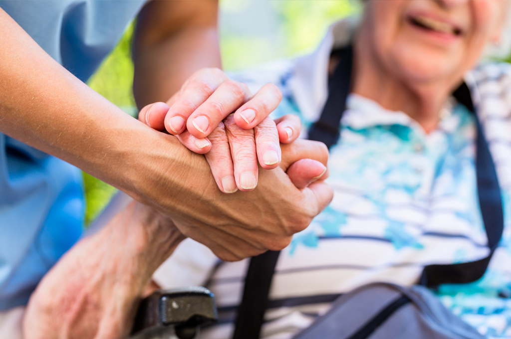 Elderly Person with Caregiver